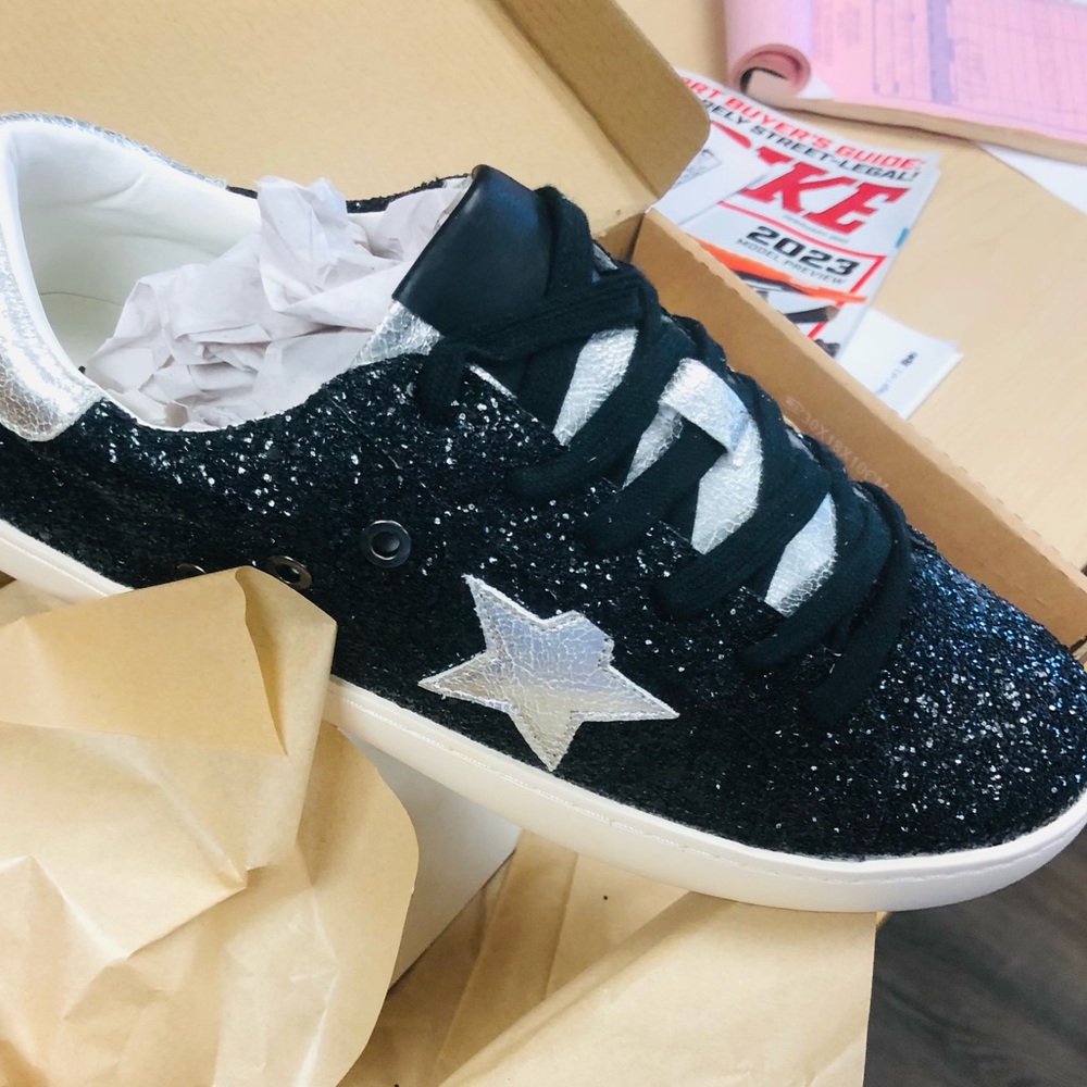 75.) Center Stage Glitter Sneakers